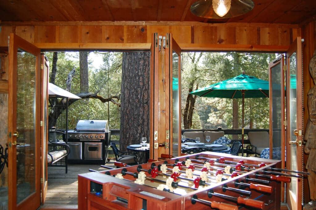open doors to deck with foosball table