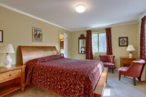 bedroom with red bedding