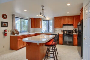 kitchen with island and wood cabinets