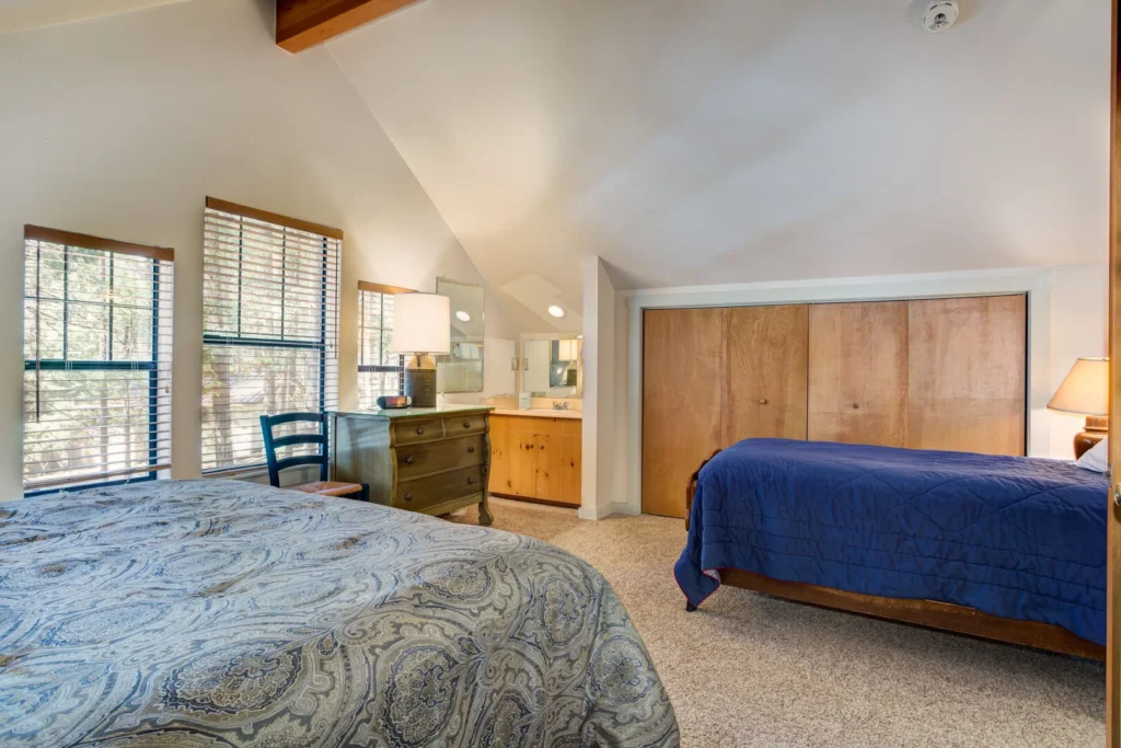 bedroom with queen bed and double bed