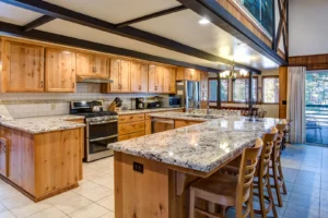 kitchen with wood cabinets and bar seating