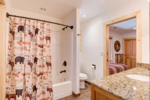 bathroom with shower and tub