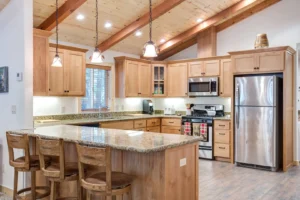 kitchen with vaulted ceilings and beams