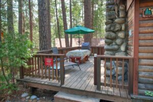 deck with outdoor seating and grill