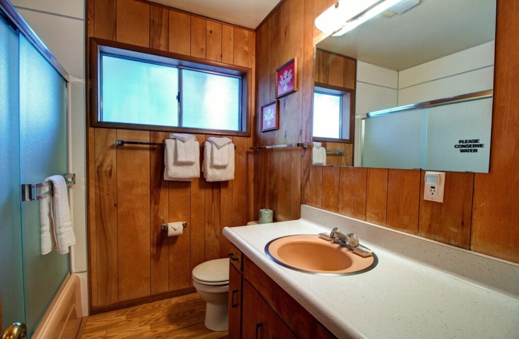 bathroom with shower and tub