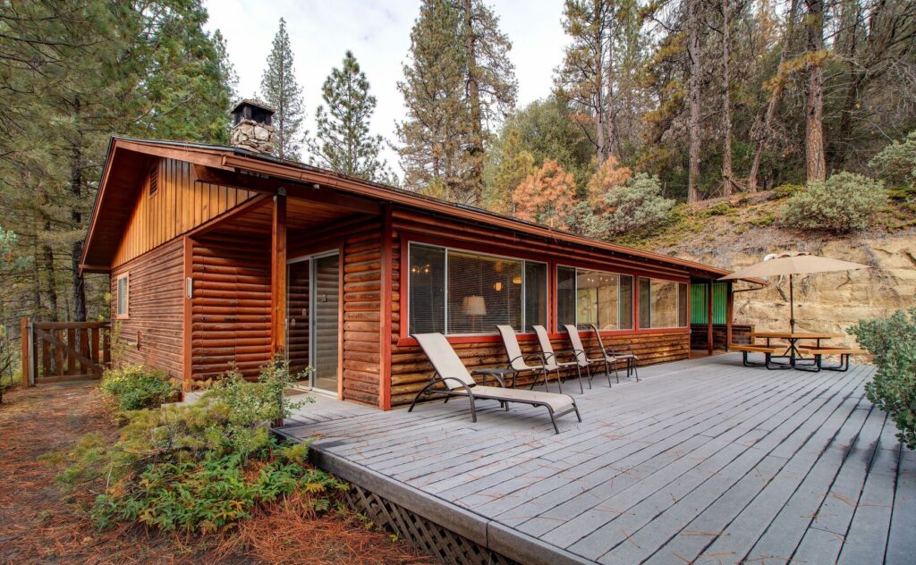 exterior of house with deck and outdoor seating and dining