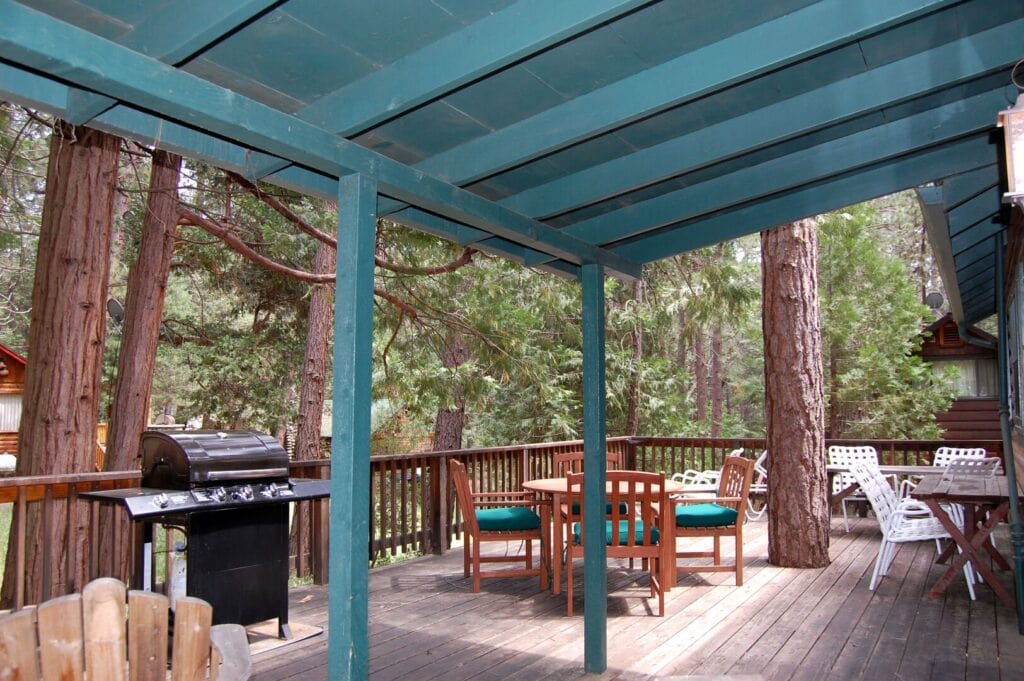 deck with covering and grill and outdoor seating