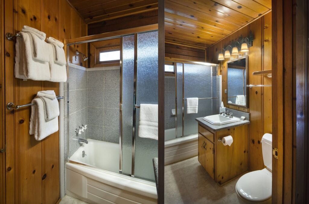 bathroom with shower and tub
