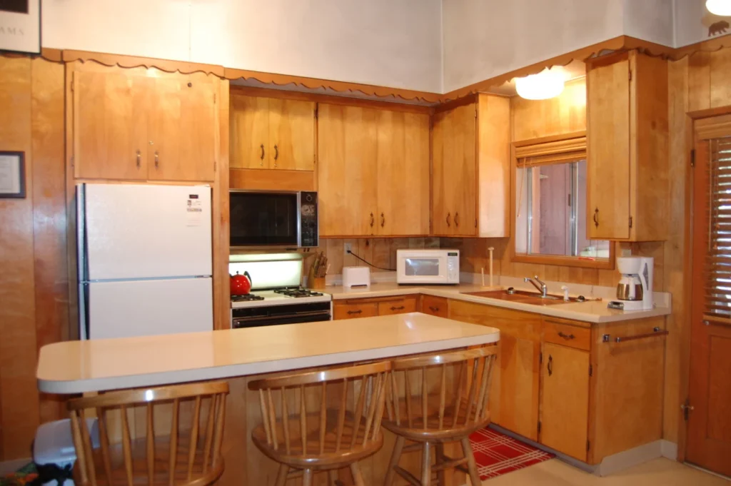 kitchen with wood cabinets and island seating