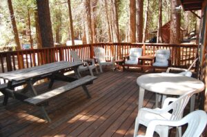 deck with outdoor seating and dining