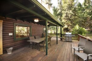 deck with outdoor seating and dining