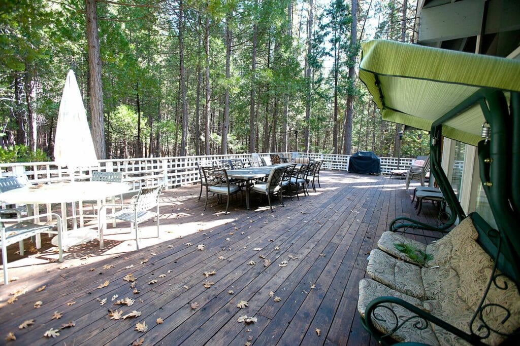 deck with outdoor seating and dining