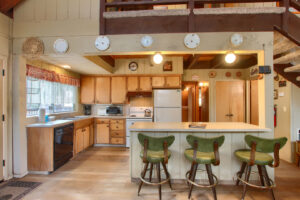 kitchen with wood cabinets and island seating