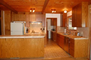 kitchen with wood cabinets and wood ceiling