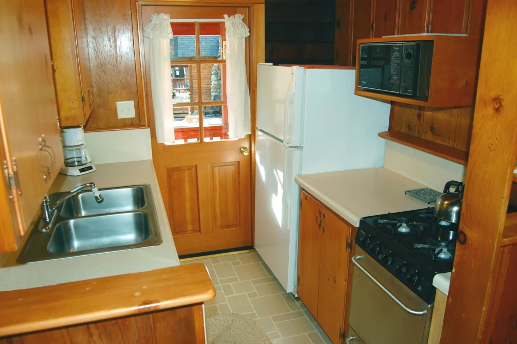 galley kitchen with wood cabinets