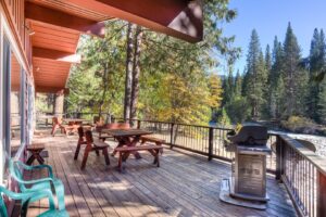 deck with outdoor seating and grill