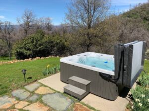 patio with hot tub