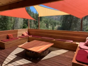 patio with sun covers and benches