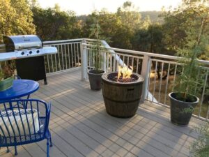 deck with seating and fire pit