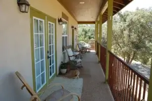 long balcony extending the side of the house