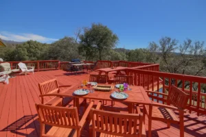 large red deck with seating