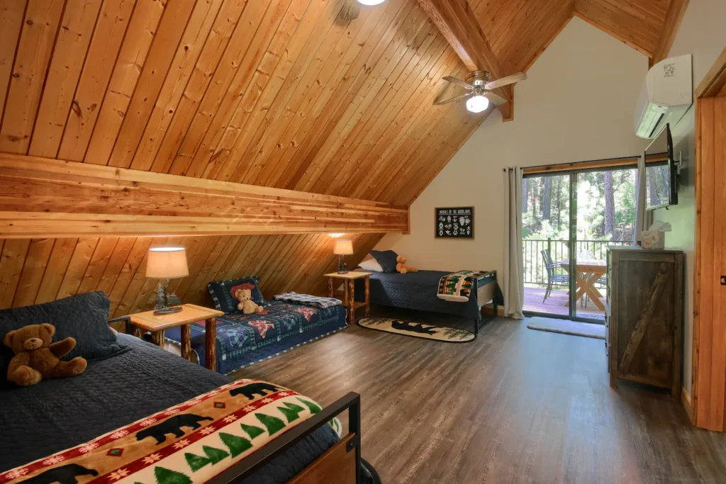 loft with two twin beds and a trundle bed