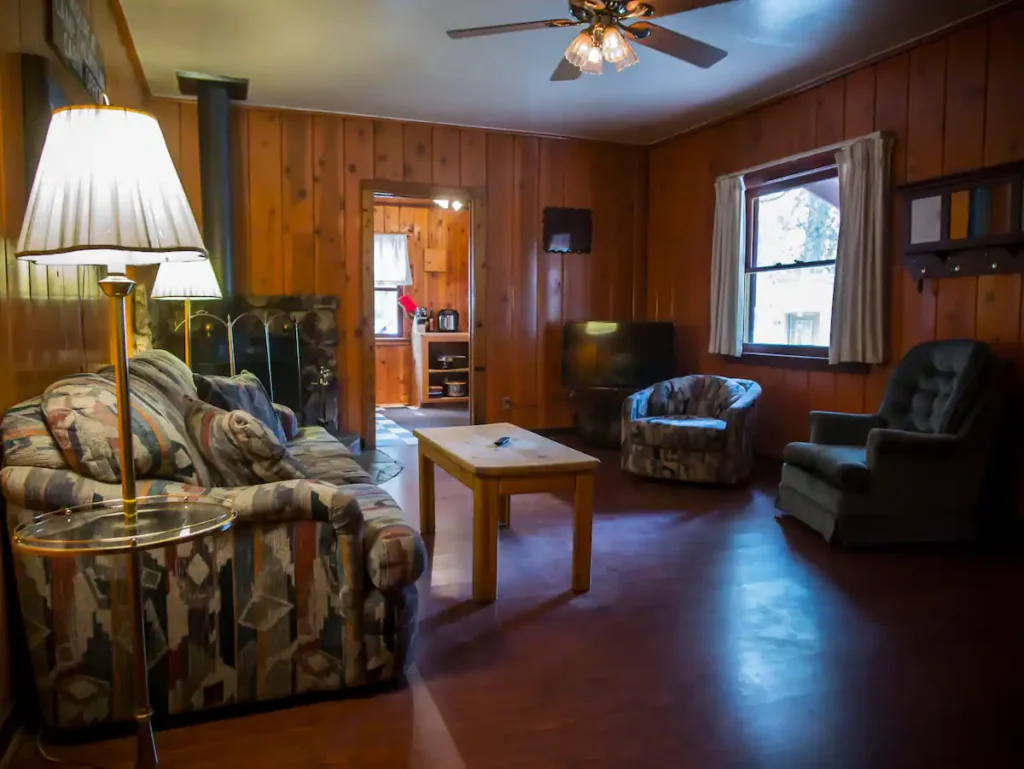 living room with couches and chairs