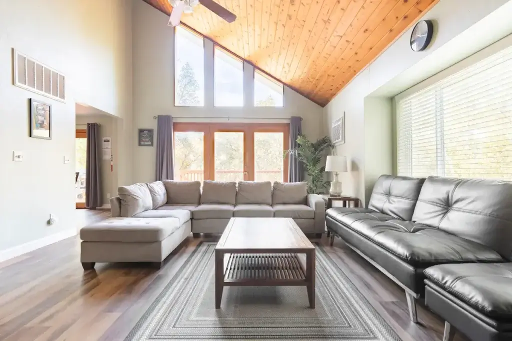 living room with vaulted ceiling