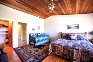 bedroom with queen bed and daybed