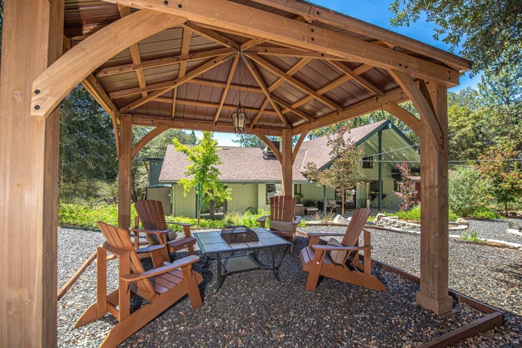 gazebo with seating and fire pit