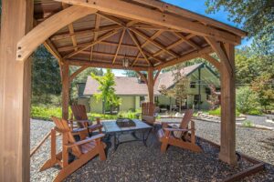 gazebo with seating and fire pit