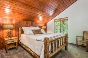 bedroom with wood slatted ceiling