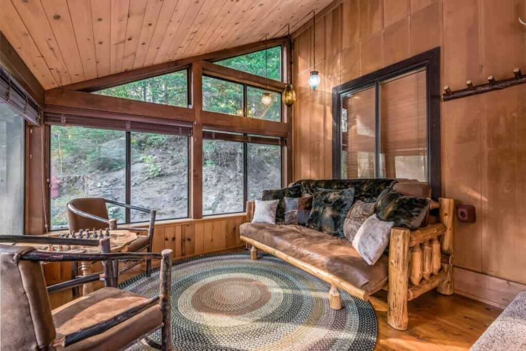 sunroom with seating and windows