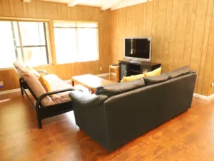 living area with seating and tv