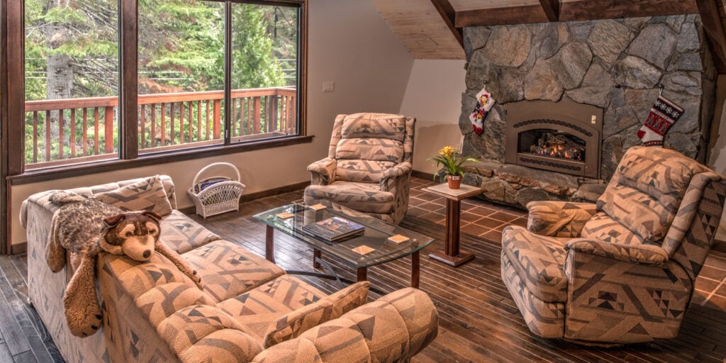 living room with seating and fireplace