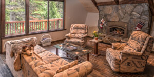 living room with seating and fireplace