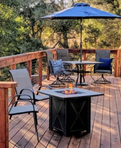 deck with outdoor seating and fire pit