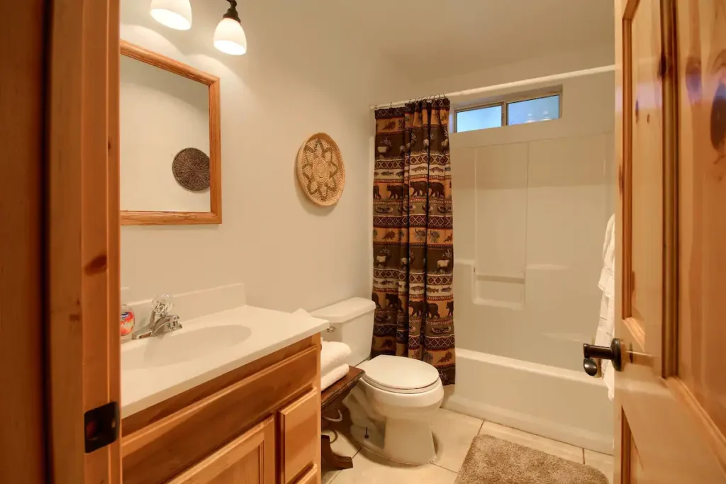 bathroom with bath tub shower
