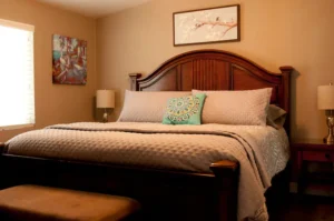 bedroom with wood bedframe
