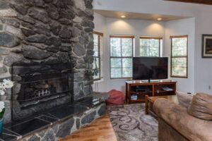 living room fireplace and television