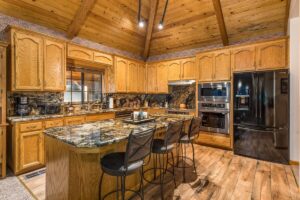 kitchen with tall ceilings and island