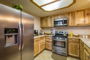 kitchen with stainless steel appliances and wood cabinets