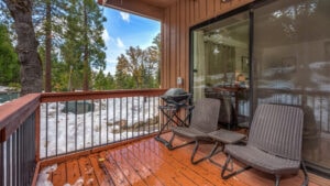 deck with outdoor seating and grill