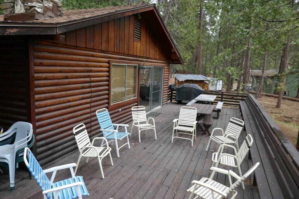 deck with grill and outdoor seating