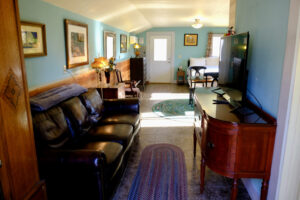 living area with television and couch