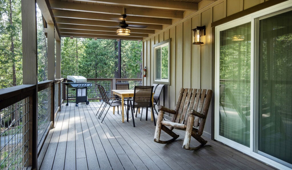 deck with seating and grill