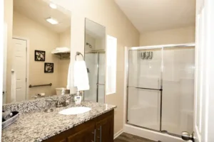 bathroom with shower and tub