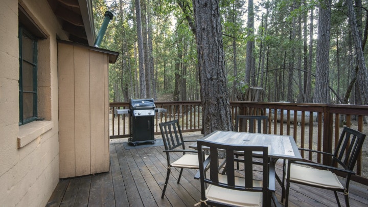 deck with outdoor seating and grill