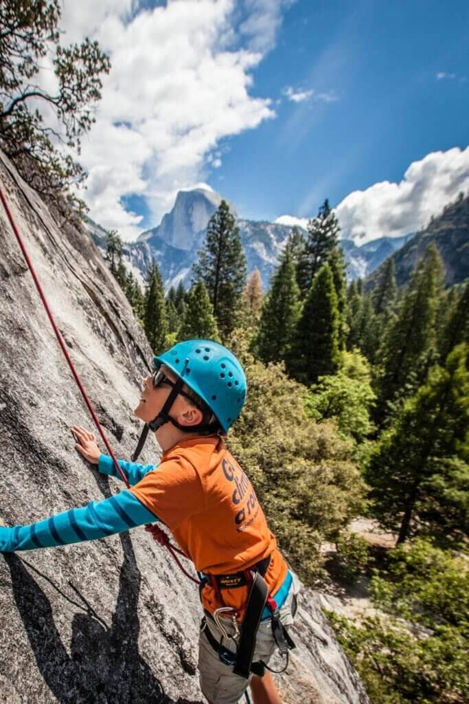 Boy rockclimbing