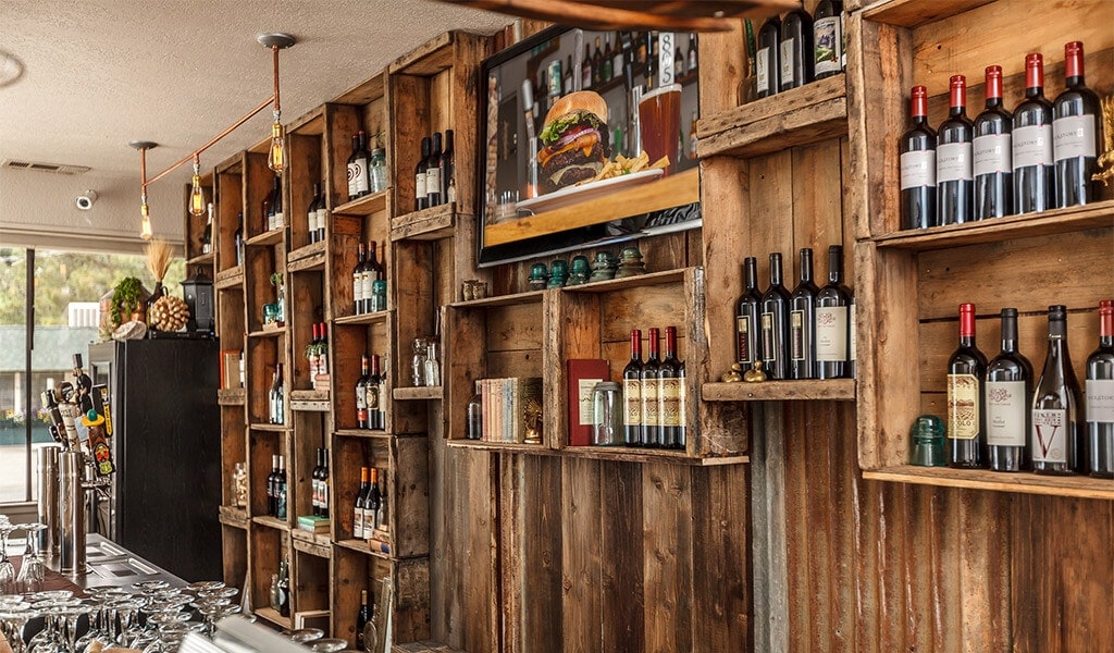 Wine, beer and spirits behind the bar inside the1850 Brewing Company